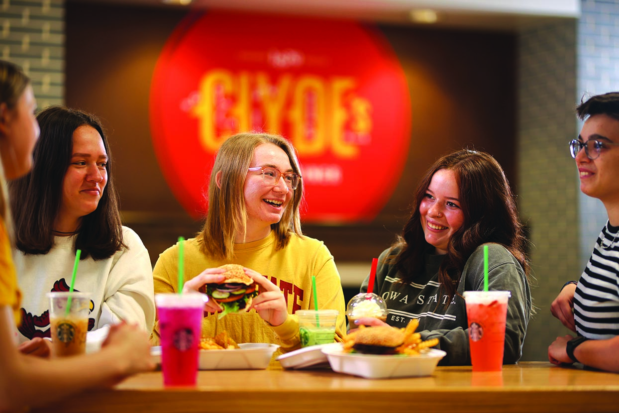 A group of students having a meal at Clyde's.